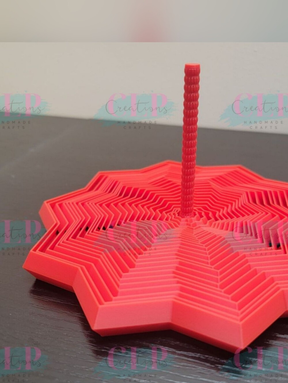 3D Printed Large Red Geometric Star Spiral Fidget toy